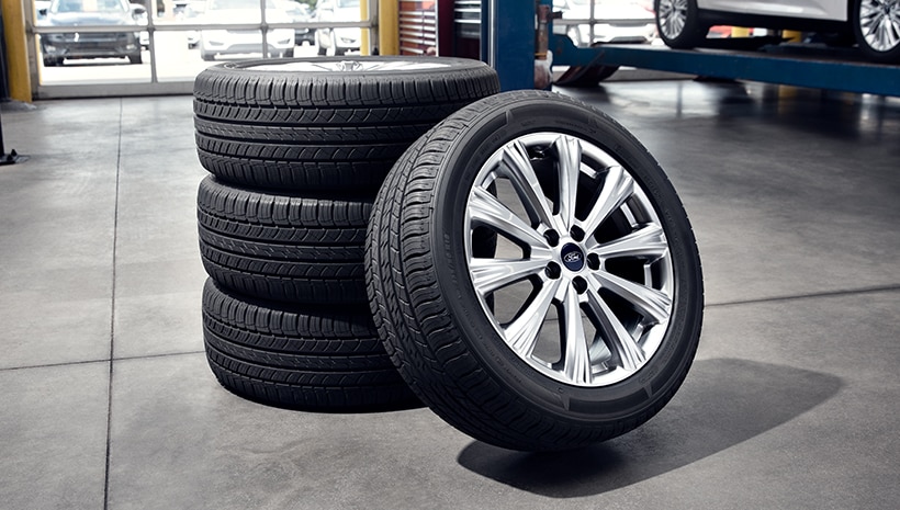 Stack of tires in a service bay.