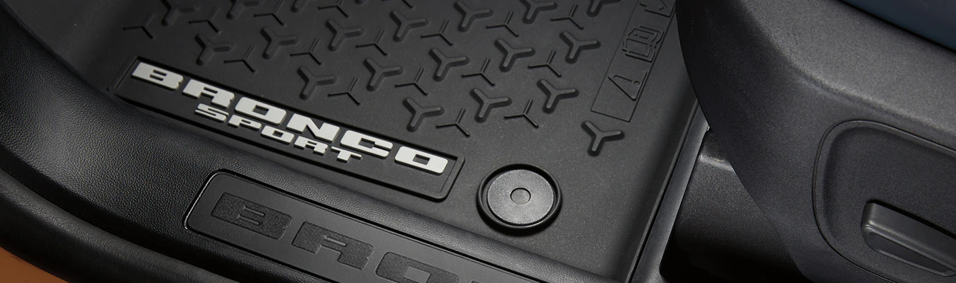 The branded sill plate and available interior weather mat of a Bronco Sport® SUV