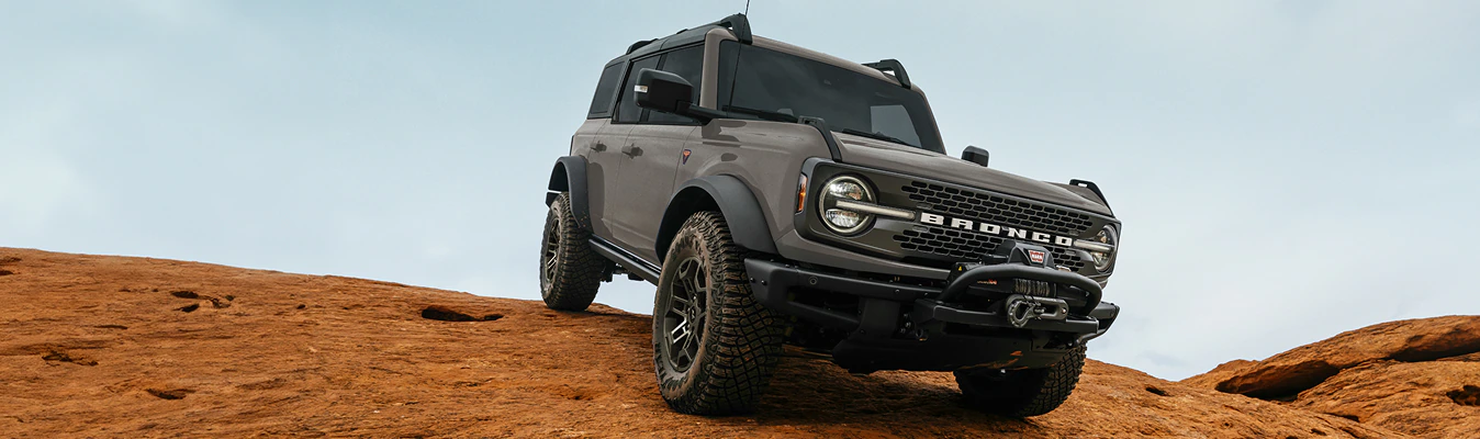 The Ford Bronco® SUV descends a rock formation