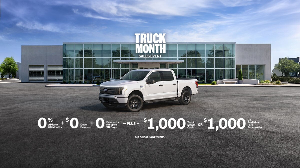 The F-150® Lightning® truck parked outside a dealership.