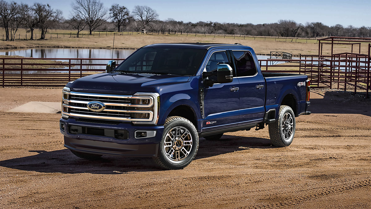 A 2026 Ford Super Duty® F-350® Platinum® truck is parked in the sun at a ranch